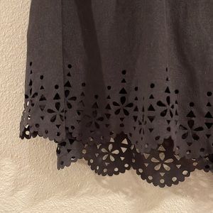 super cute Justice skirt with laser cut detail to hem